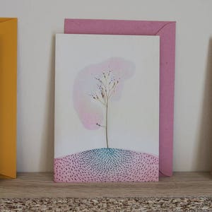 Cartolina d'auguri: erba halm sulla terra