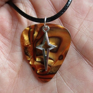 Tiger&#39;s Eye Guitar Pick Cross 19&quot; Necklace: Stardust Charm, Black Cord