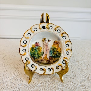 Early 20th Century Italian Capodimonte Cherub Scene Ceramic Relief Plate