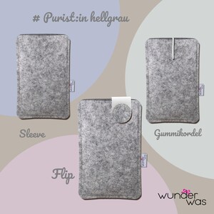 May include: Three light gray felt sleeves with stitched edges. One sleeve is plain, one features a white elastic cord closure, and one includes a circular flap with a white tab. Each sleeve has a small white tag labeled wunder was.