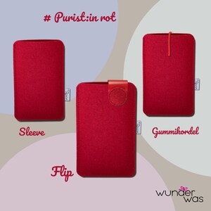 May include: Three red felt protective cases labeled Sleeve, Flip, and Gummikordel. The Sleeve is a simple pouch, the Flip features a top closure tab, and the Gummikordel includes an elastic cord. Each case has a small white tag reading wunder was.