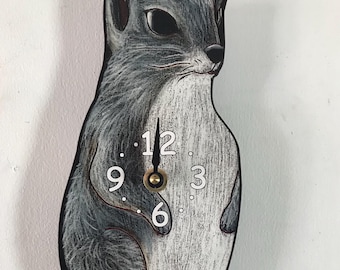 Squirrel clock with tail that swings!