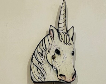 Unicorn Clock with swinging rainbow pendulum