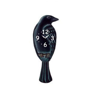 May include: Black and green bird-shaped clock with a white face and black hands. The clock face has the numbers 12, 9, 6, and 3.