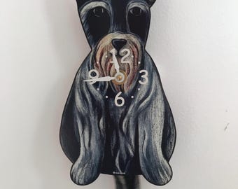 Schnauzer dog clock with wagging tail