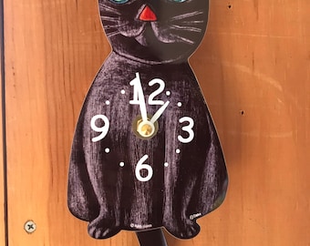 Black mini Cat clock with swinging tail