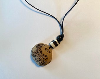 Makalani Nut Key necklace; hand carved