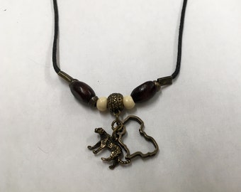 Necklace and earrings with Cheetah and Africa Charms