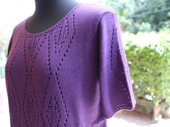 purple sweater
