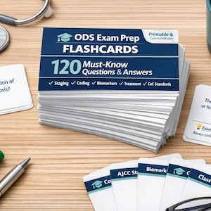 May include: A stack of flashcards for ODS Exam Prep with the text "120 Must-Know Questions & Answers." The cards are white with blue text and a blue border. A stethoscope, pens, and a mug are also visible.