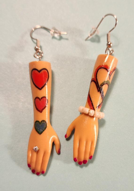 Barbie arm deals earrings