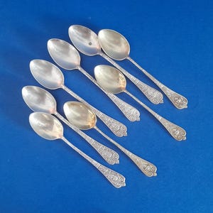 Vintage Silberne Teller Kleine Löffel aus Schweden_1950. Einzigartige alte Skandinavische Löffel, kleine Gravur-Gesichter-Löffel_8 Stk.
