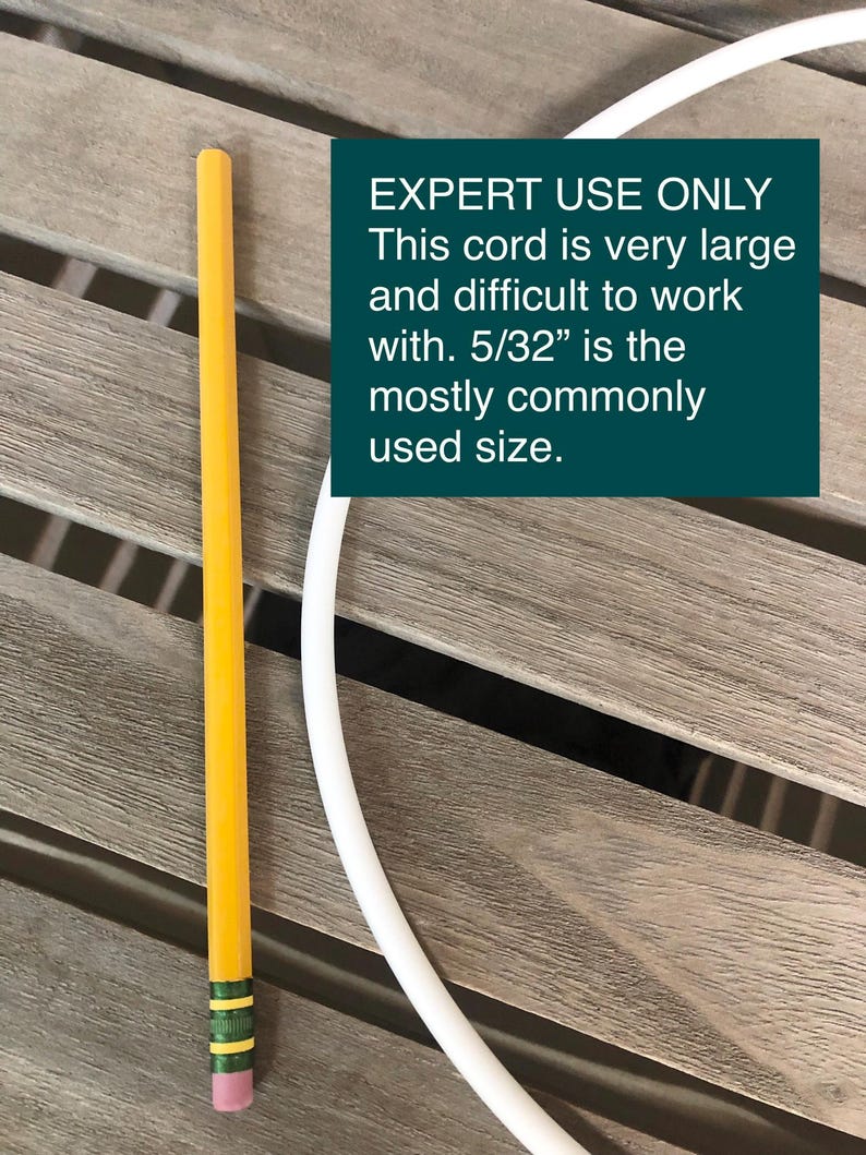 May include: A yellow pencil with a pink eraser and a white cord are on a wooden surface. A teal rectangle contains the text "EXPERT USE ONLY. This cord is very large and difficult to work with. 5/32" is the mostly commonly used size."