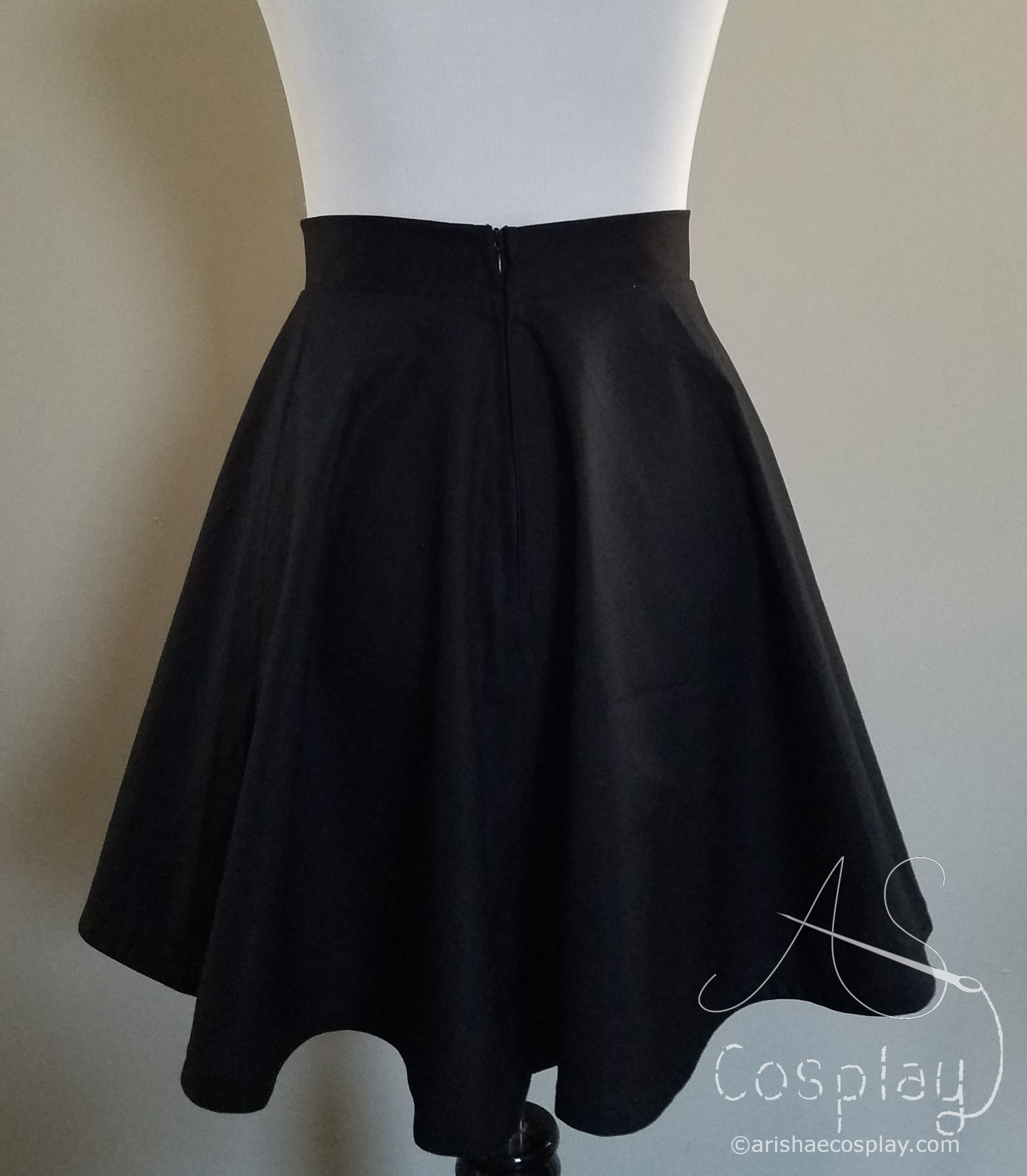 Black mini circle skirt discount