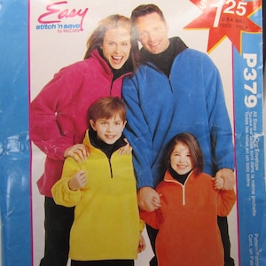 May include: A sewing pattern package featuring a family wearing matching fleece pullovers in pink, blue, yellow, and orange. The package has the text "PRICE BUSTER" and "Easy stitch 'n save by McCall's".