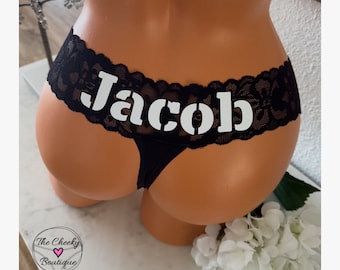 Add a name to the back of a authentic Victorias Secret Black Lace Waist Thong