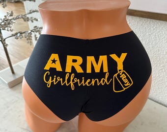 Army Girlfriend with personalized dog tags on a black no-show Victoria's Secret cheeky underwear