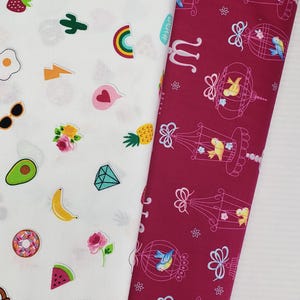 May include: Two fabric patterns. One is white with colorful food and icon graphics. The other is a deep red with birdcages and birds. The fabrics are likely cotton or a similar material.