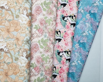 May include: Four different fabric swatches with floral patterns. The fabrics are all in shades of pink, blue, and green. The patterns feature flowers, leaves, and vines. The fabrics are all cotton.