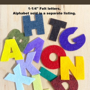 May include: Assortment of felt letters in various colors, including yellow, red, blue, green, and purple. The letters are 1-1/4 inches tall and spell out the word "HTOAKONLD". The letters are on a wooden surface.  Use these letters to spell names, phrases, bible verses and more.