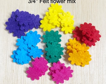 May include: A mix of felt flower shapes in various colors, including blue, green, yellow, red, and pink. The flowers are 3/4 inch in size.