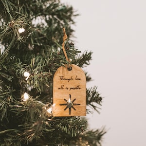 Crescent City "Through love, all is possible" Wooden Ornament