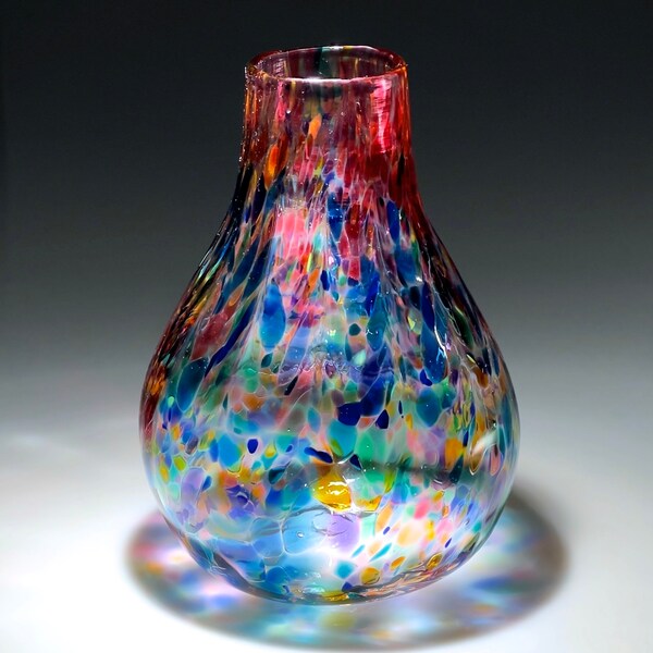 Sweet little handblown glass vase in rainbow colors