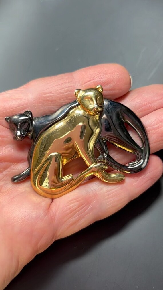 pin,cats, 2 cats being loving,gold and hematite,la