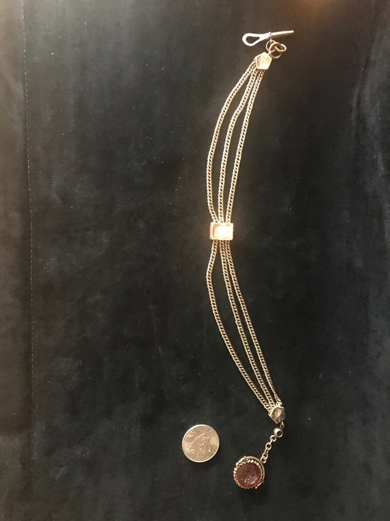antique watch chain, key, and fob Gem
