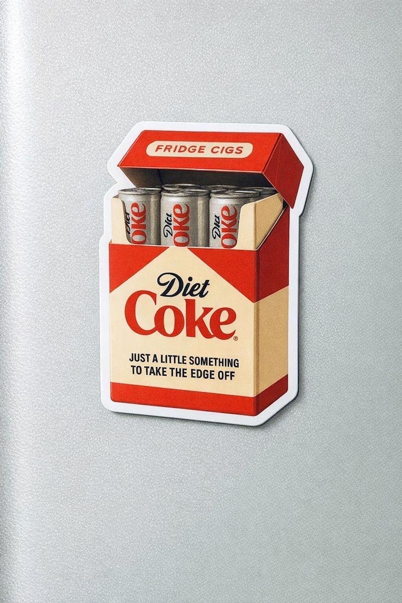 May include: A novelty sticker resembling a Diet Coke cigarette pack. The red and beige pack reads "Diet Coke" and "Just a little something to take the edge off." Inside are three Diet Coke cans. The top flap reads "FRIDGE CIGS."