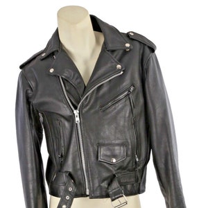May include: A black leather motorcycle jacket with a zipper closure, a belt, and multiple pockets.