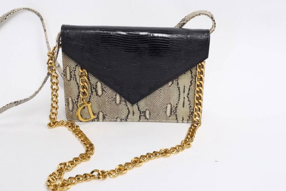 Snake print designer bag sale
