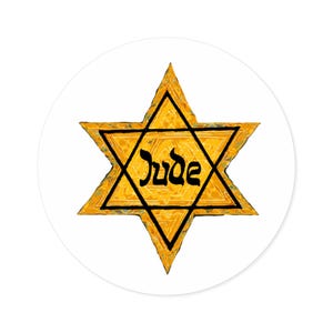 May include: A yellow six-pointed star with a black outline and the word "Jude" written inside. The star is on a white background.