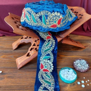 Velvet blue braid with colorful embroidery and purple rhinestones, traditional decoration of Afghan clothes, baludji, Indian lace.
