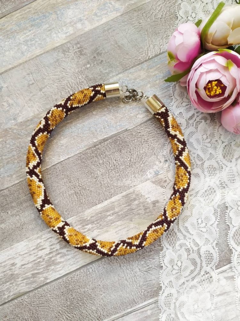 Ethnic necklace Brown Snake necklace Ouroboro beaded crochet necklace