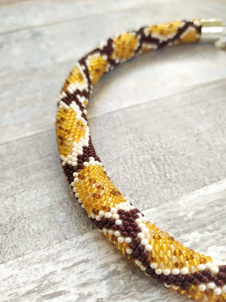 Ethnic necklace Brown Snake necklace Ouroboro beaded crochet necklace