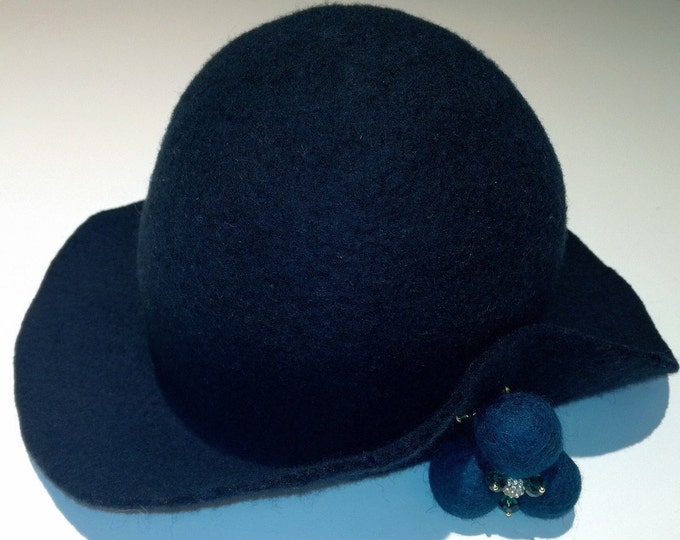 Decorated felt wool hat with a wool brooch and Swarovski glass beads