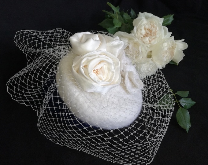 Small wedding hat in felted merino wool.