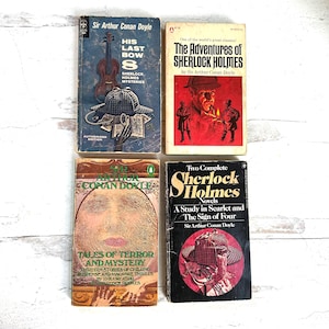 May include: Four vintage books by Sir Arthur Conan Doyle, featuring Sherlock Holmes stories. The covers display illustrations and titles such as "His Last Bow," "The Adventures of Sherlock Holmes," "Tales of Terror and Mystery," and "A Study in Scarlet and The Sign of Four."