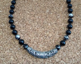 Black and silver necklace with toggle clasp