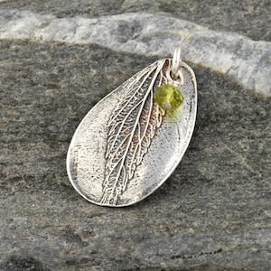 Spirea leaf pendant with olive green peridot, gift for nature lover, Irina Miech