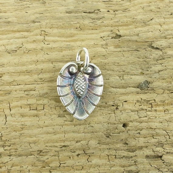handmade jewelry by Irina Miech Lab created blue spinel pendant with fine silver Art Nouveau frame