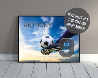 May include: Personalized soccer poster with a player kicking a soccer ball against a blue sky background. The poster features the name "ANTHONY" and the number "9".