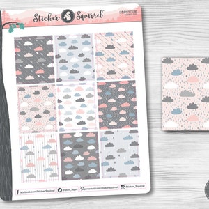 May include: A sheet of 9 planner stickers with a cloud and raindrop pattern in shades of pink, gray, and blue. The stickers are designed for use in a planner or journal.