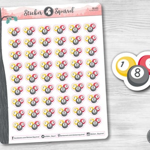 May include: A sheet of 48 stickers featuring a set of three billiard balls, numbered 1, 3, and 8. The balls are arranged in a heart shape. The stickers are white with a pink outline. The background is a wooden surface.