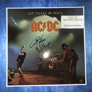 Angus Young & Malcolm Young AC/DC Hand Signed Autograph Photo COA