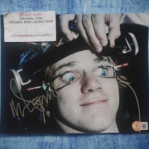 Malcolm McDowell Hand Signed Autograph 8x10 Photo BAS COA