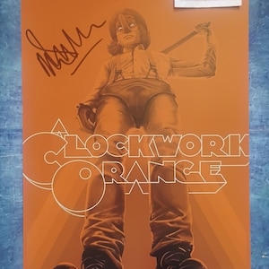 Malcolm McDowell Hand Signed Autograph 12x18 Photo BAS COA