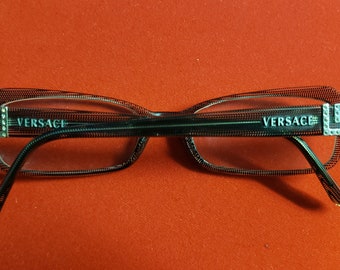 Versace authentic ladies reading glasses in excellent pre-owned condition. The strength is 135 .