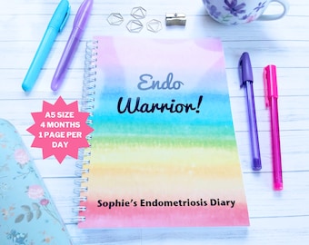 May include: A rainbow-colored journal with the text "Endo Warrior!" and "Sophie's Endometriosis Diary". The journal is A5 size and has 4 months worth of pages, with one page per day.